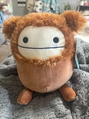 Benny the Bigfoot Squishmallow 7 inch with tinsel.